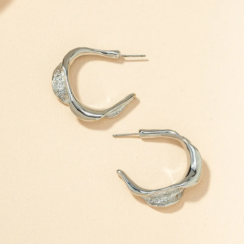 Chic Metallic C-Shaped Gold Earrings from Vienna Verve